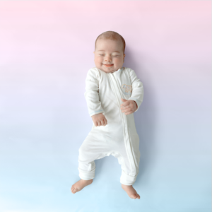 Baby in a Pip Pea Pop babysuit