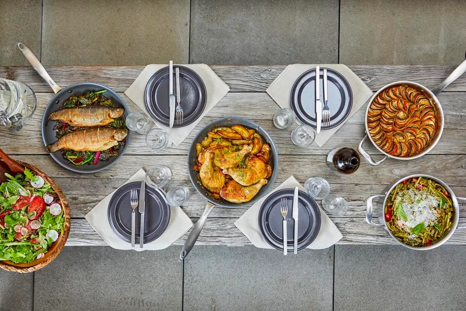 A dining set with cookware from ABBIO